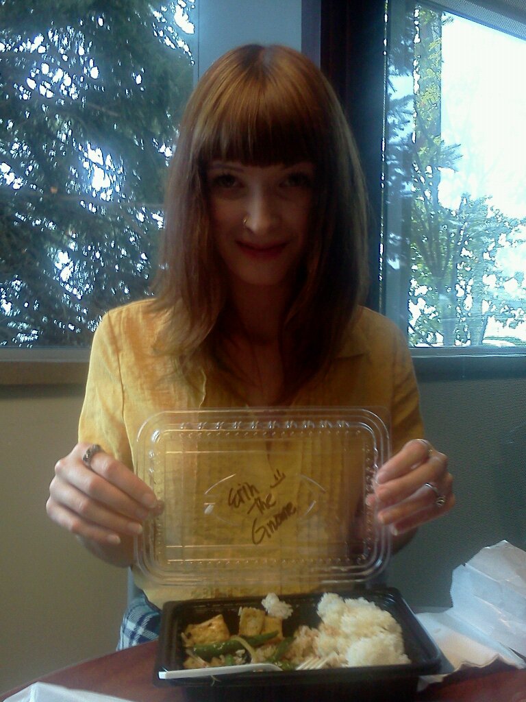 'Erin the Gnome' holding her Thai Fusion box.